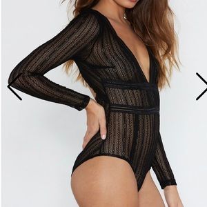 Never worn sheer, lace black bodysuit.